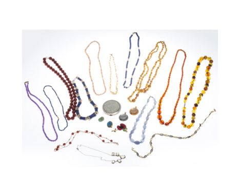 A collection of jewelleryto include a single strand of amethyst beads, to a 9ct gold clasp; a coral bead set necklace, a lapi