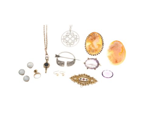 A collection of jewelleryto include a Victorian 9ct gold ruby and seed pearl set brooch, a belcher link guard chain, stamped 