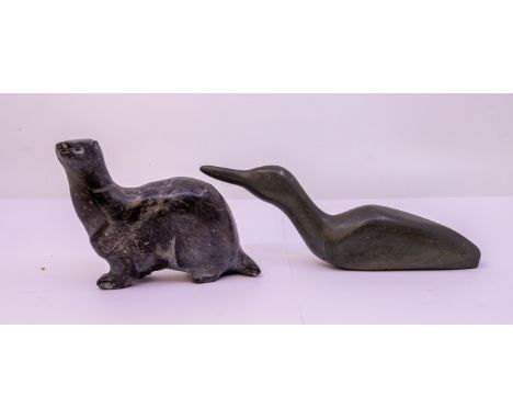 A carved jade green soapstone figure of a Sea Lion with her pup, approx 23cm wide together with a carved polished stone sea l