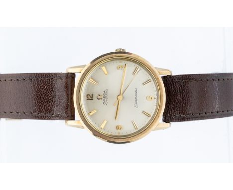 Omega- a gentleman's vintage 9ct gold Omega Seamaster automatic wristwatch, comprising a round silvered signed dial with appl