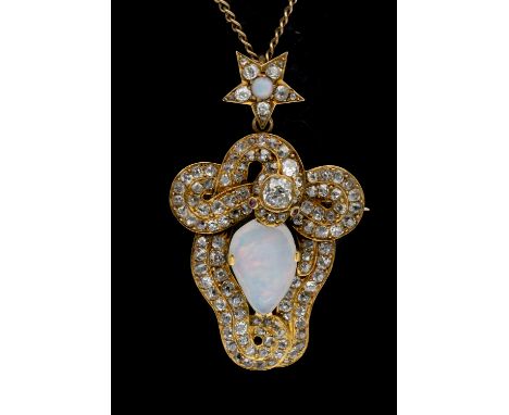 An antique opal and diamond gold pendant/brooch, comprising a central opal with red and green play of colour, within a diamon