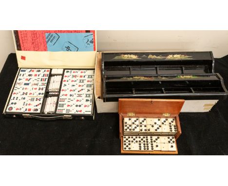 A 20th Century Mahjong set, cased together with a set of four Chinese lacquered Mahjong tile stands, cased and a cased vintag