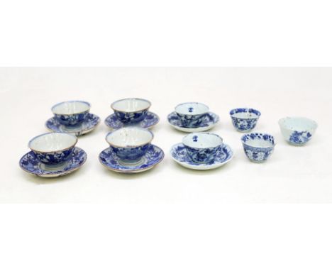 Two similar Chinese blue and white porcelain tea bowls and saucers, Qing Dynasty circa 1740, of lotus moulded shape, painted 