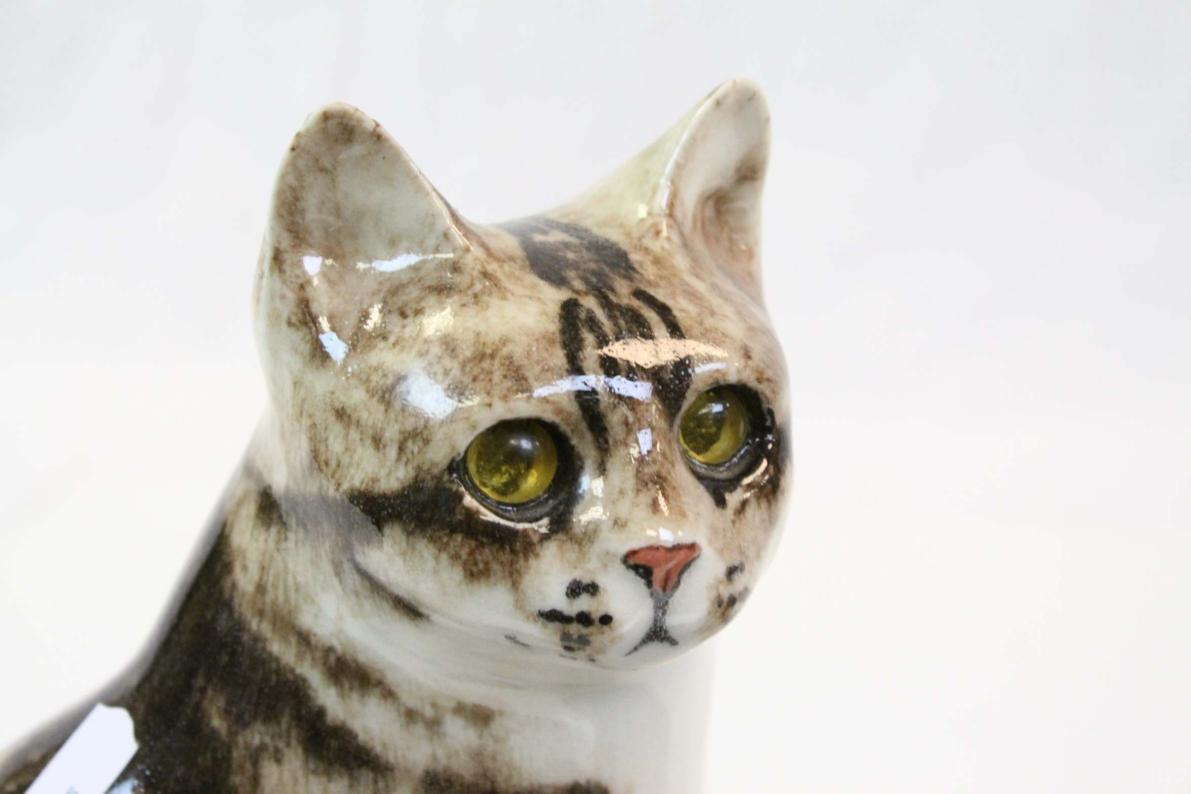 Winstanley Pottery tabby cat, seated, signed to base, size 4, together ...