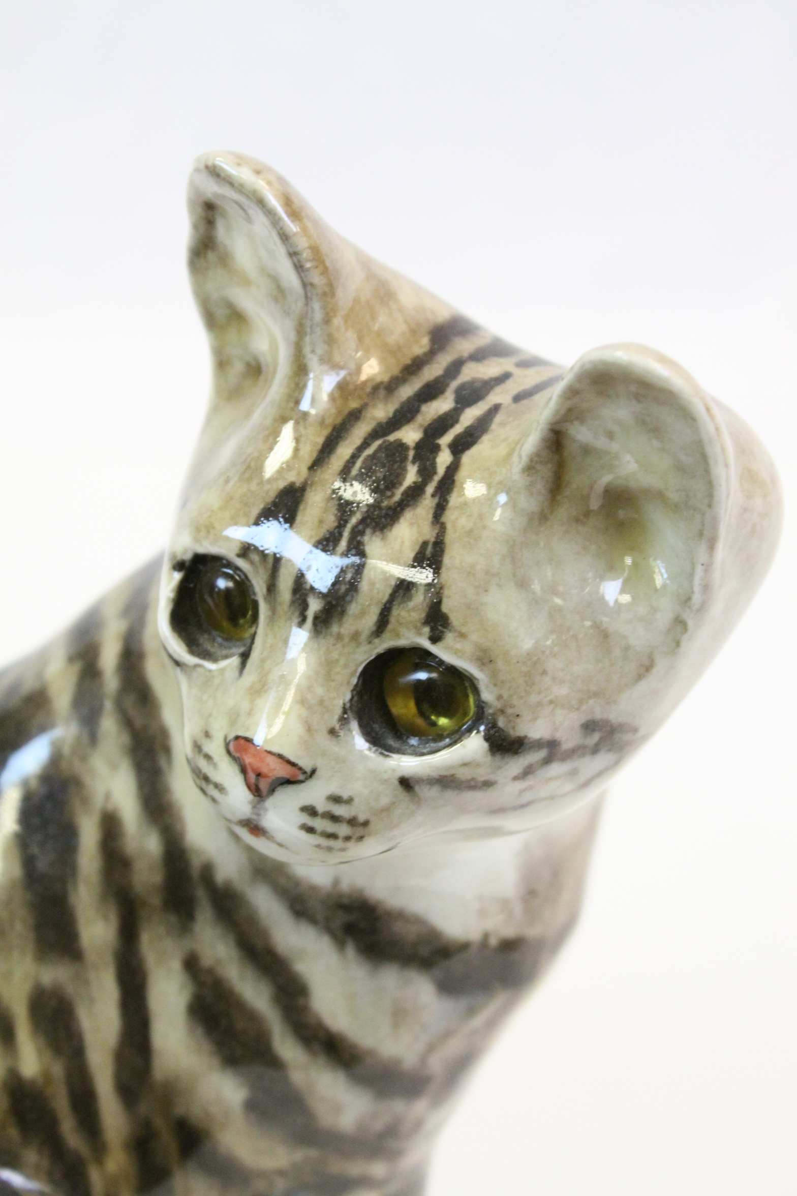 Winstanley Pottery tabby cat, seated, signed to base, size 4, together ...