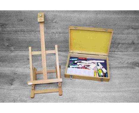 Artist box and contents with small artists easel