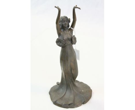 A bronzed spelter Art Deco lamp base in the form of a lady