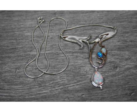 A Silver and Opal necklace in the Art Nouveau Style