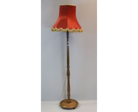 Turned wooden standard lamp with knopped stem, circular foot, with shade