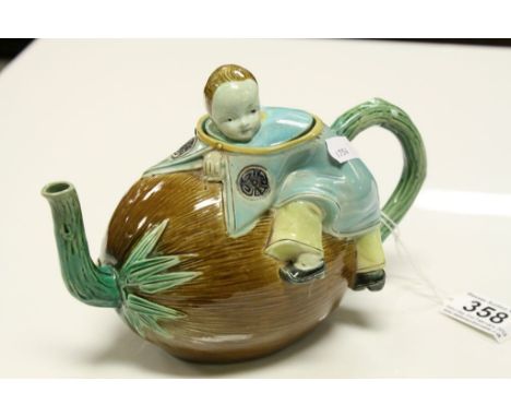 Joseph Holdcroft Victorian Majolica Chinaman teapot, the Chinaman clambering over a coconut, his head and shoulders forming t