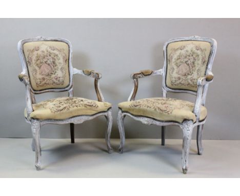 Pair of Regency style shabby chic arm chairs, tapestry seats and backs, carved floral and foliate decoration, height approxim