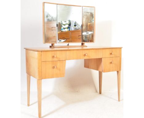 Gordon Russell Of Broadway - An original 20th Century retro vintage walnut dressing table having a straight run of drawers wi