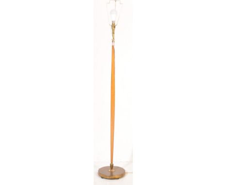 A retro vintage mid 20th century teakwood standard lamp of tapering form raised on a circular metal base. Measures 148cm tall