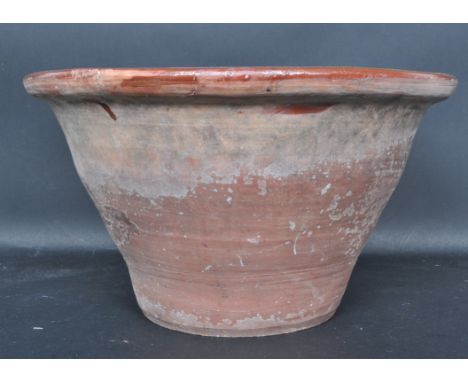 A circa 1900s ceramic dairy / milk churn bucket of tapering form having a lipped rim with glazed interior.&nbsp; Measures 27c