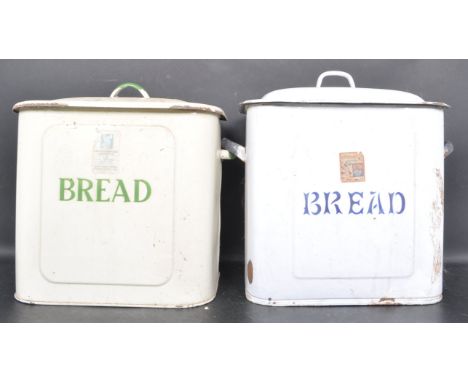 A pair of vintage retro mid 20th century enamel bread bins. The two bread bins of a tall rectangular form with original lids 
