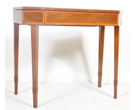 An 19th century George III mahogany card table having satinwood crossbanding raised on four tapering legs. Measures 74 x 86 x