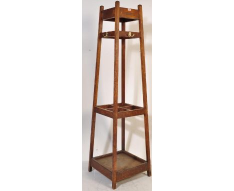 An early 20th century oak school industrial A-frame coat rack / pub coat stand. The coat rack of a tall sizes having a tapere