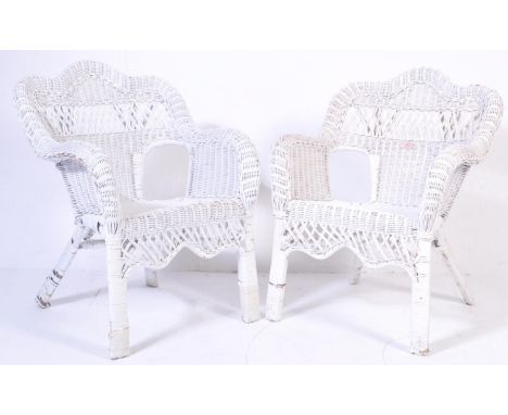 A pair of vintage retro 20th century bamboo and white painted wicker armchairs / easy chairs in the manner of Franco Albino. 