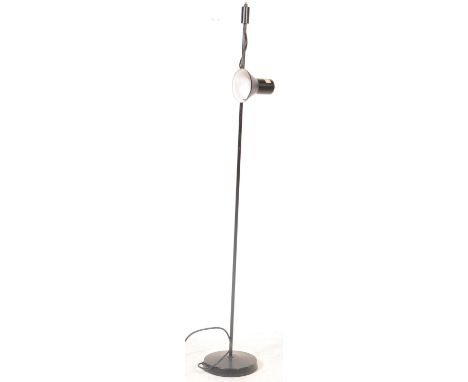 A vintage retro 20th century circa 1970’s standard lamp. The floor standing lamp having tubular column with a single spot lig