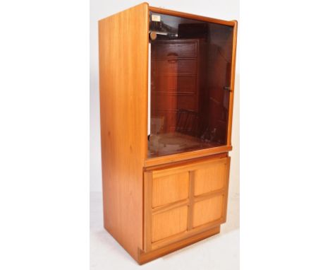 A mid century retro Nathan Furniture teak wood  side cabinet (hi-fi separate) with upper shelf section enclosed by a smoke gl