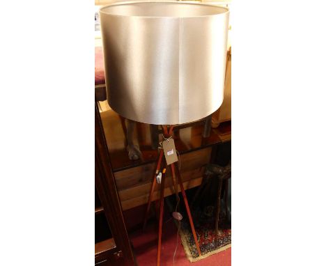 A contemporary brushed gilt metal standard lamp, with integral shade, overall h.159cm
