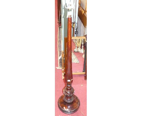 A turned and stained walnut standard lamp, height 120cm