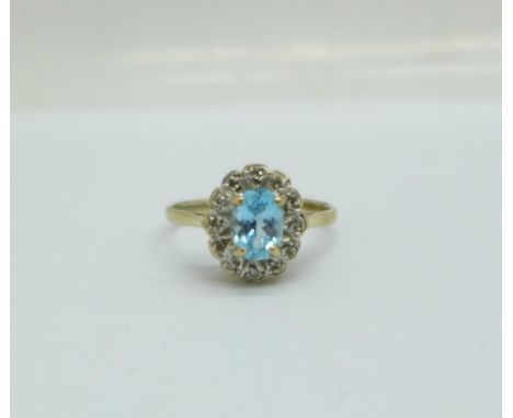 A 9ct gold, aquamarine and diamond ring, 2.2g, N 