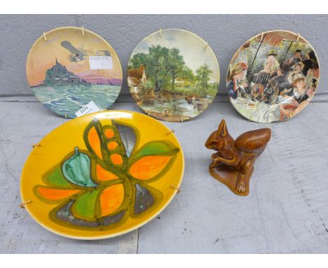 A Poole Pottery squirrel and dish and three other plates **PLEASE NOTE THIS LOT IS NOT ELIGIBLE FOR POSTING AND PACKING** 