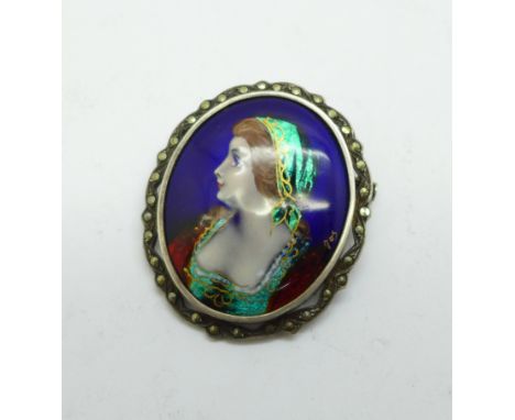 A silver and enamel portrait brooch, 33mm x 40mm 