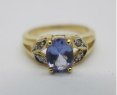 An 18ct gold, tanzanite and diamond ring, 4.5g, N 