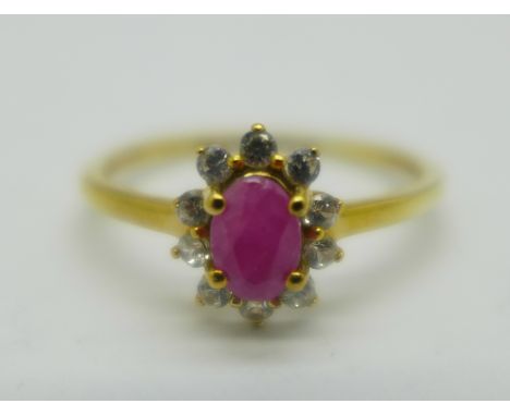 A silver gilt ruby and zircon cluster ring, T 