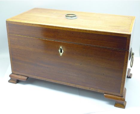 A George III inlaid mahogany tea caddy with fitted hinged compartments, lacking centre jar, 30 x 15 x 18cm 