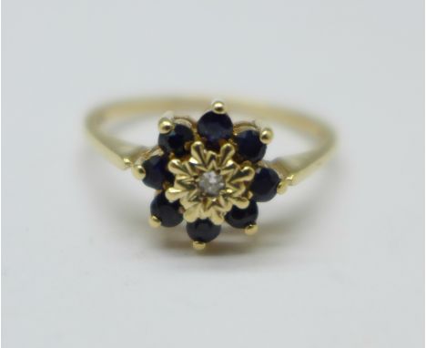 A 9ct gold, sapphire and diamond ring, P, 2.2g 