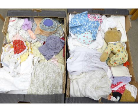 Two boxes of vintage dolls clothes and a chalk board **PLEASE NOTE THIS LOT IS NOT ELIGIBLE FOR POSTING AND PACKING**