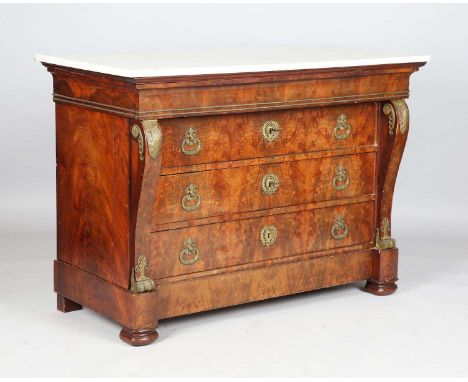 A Louis Philippe flame mahogany and gilt metal mounted commode, fitted with four oak-lined drawers, height 94cm, width 134cm,