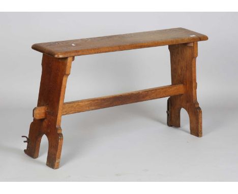 An early 20th century oak bench, possibly for onboard ship, height 66cm, width 113cm, depth 28cm.