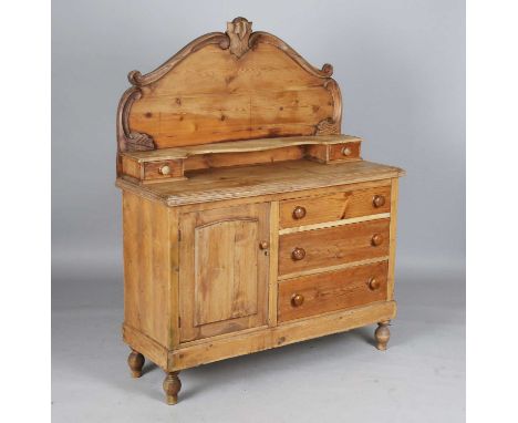 A late Victorian pine kitchen dresser, the shelf back above a cupboard and drawers, height 148cm, width 119cm, depth 45cm.