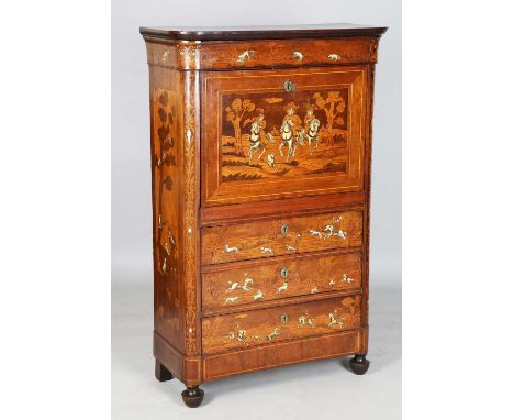 An early 19th century Continental walnut and marquetry inlaid fall front escritoire, the front and sides decorated in ivory w