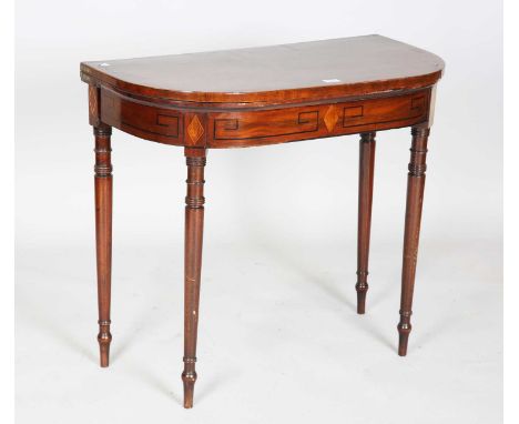 A Regency mahogany fold-over card table with rosewood crossbanding and ebony line inlay, height 73cm, width 84cm, depth 42cm.