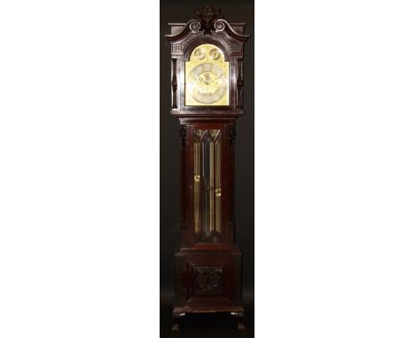 A circa 1910 mahogany long case clock, the arched brass and silvered dial inscribed "Stokes Kensington", with brass Arabic nu