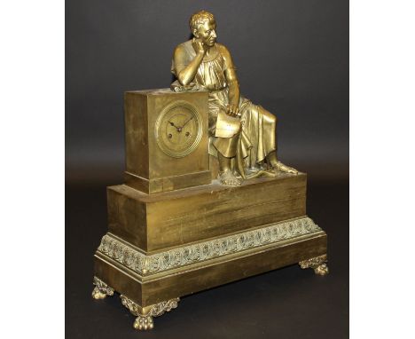 A 19th Century French gilt brass cased figural mantel clock decorated with seated figure of Cicero holding pamphlet inscribed