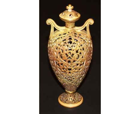 A Grainger & Co. Royal China Works Worcester pierced vase of scrolling foliate design with scrollwork handles and cover, rais