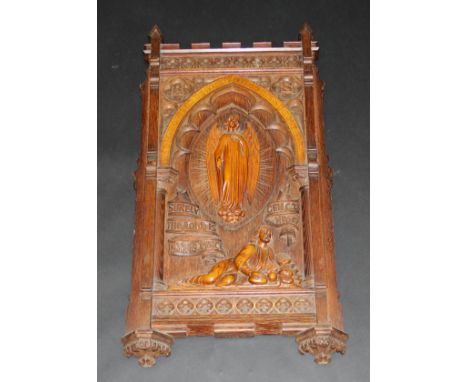 A 19th Century carved oak and fruitwood Gothic Revival religious panel inscribed "This is none other but the House of God, an
