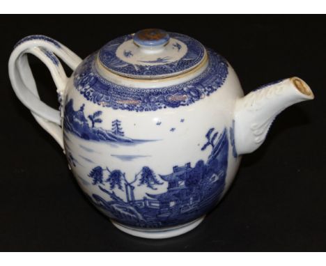 A Chinese porcelain "Willow" pattern blue and white export ware ovoid teapot with openwork handle and relief work spout, rais