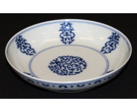 A Chinese blue and white saucer in the 18th Century taste, bearing Daoguang seal mark verso, 15.5 cm diameter CONDITION REPOR