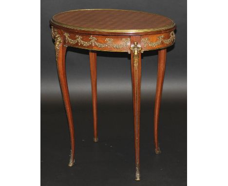 A late 19th Century French kingwood and parquetry inlaid occasional table, the oval top with ropework applied brass edging ov