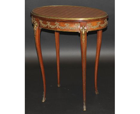 A late 19th Century French kingwood and parquetry inlaid occasional table, the oval top with ropework applied brass edging ov