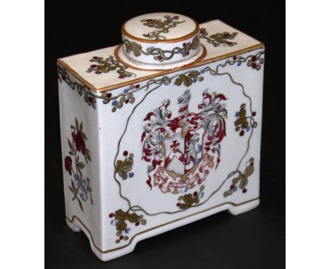 A 19th Century Chinese armorial tea caddy, bearing blue under-glazed and black over-glazed marks, 16 cm high 