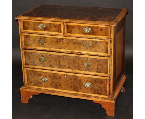An oyster walnut and boxwood strung chest in the William & Mary manner, the top with medallion decoration and moulded edge ov