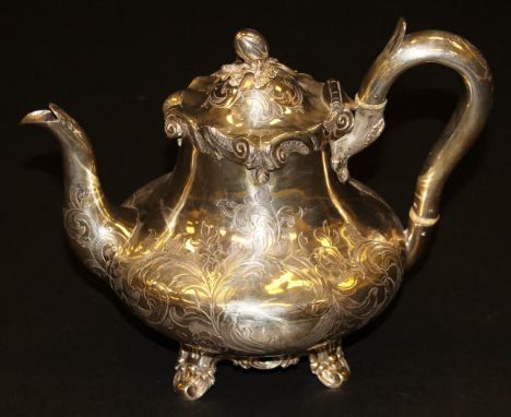 A Victorian silver engraved teapot of squash form, raised on four shell scrolled feet (by William Hunter, London, 1850), 24.8